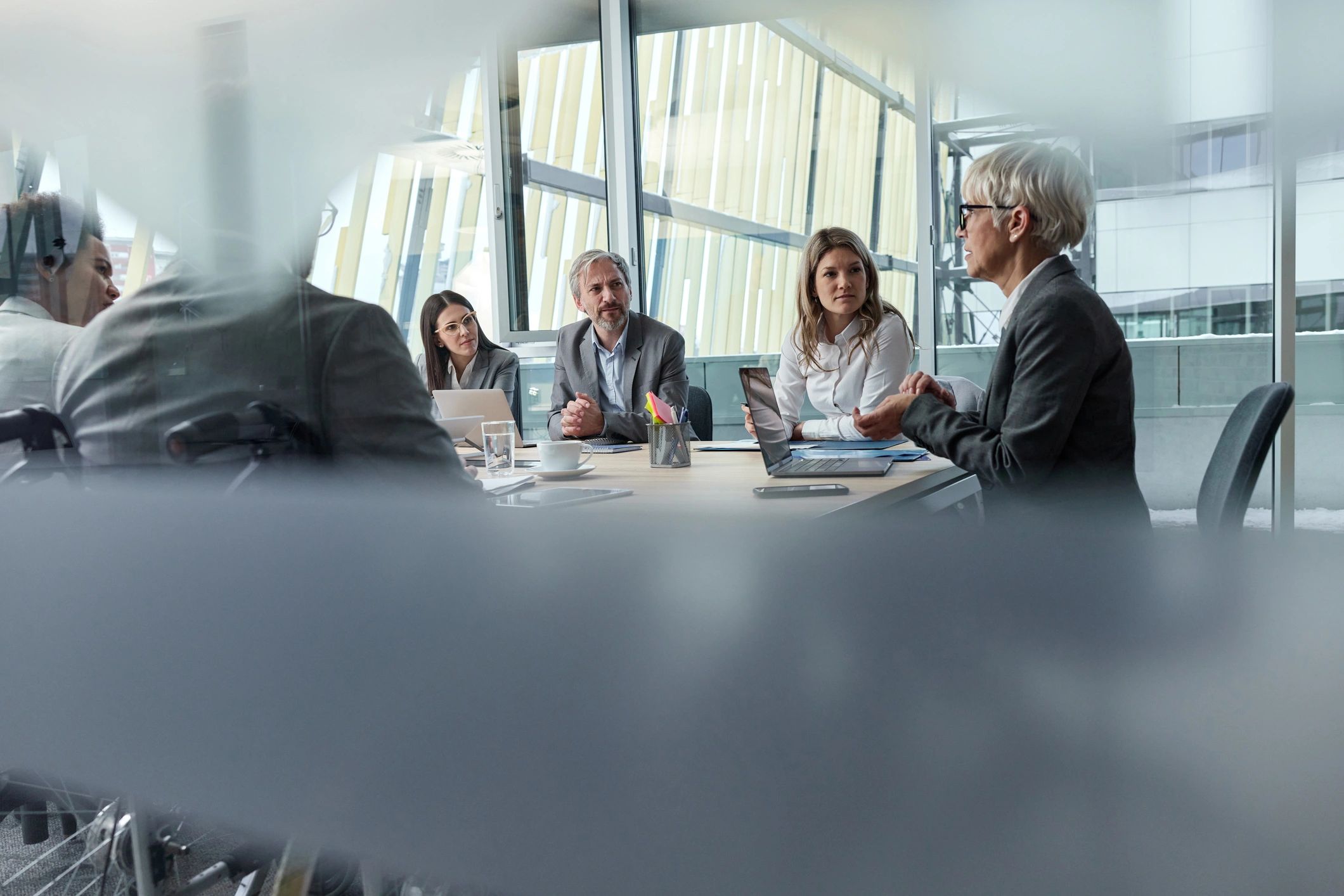 Aviation operations team meeting in a modern office