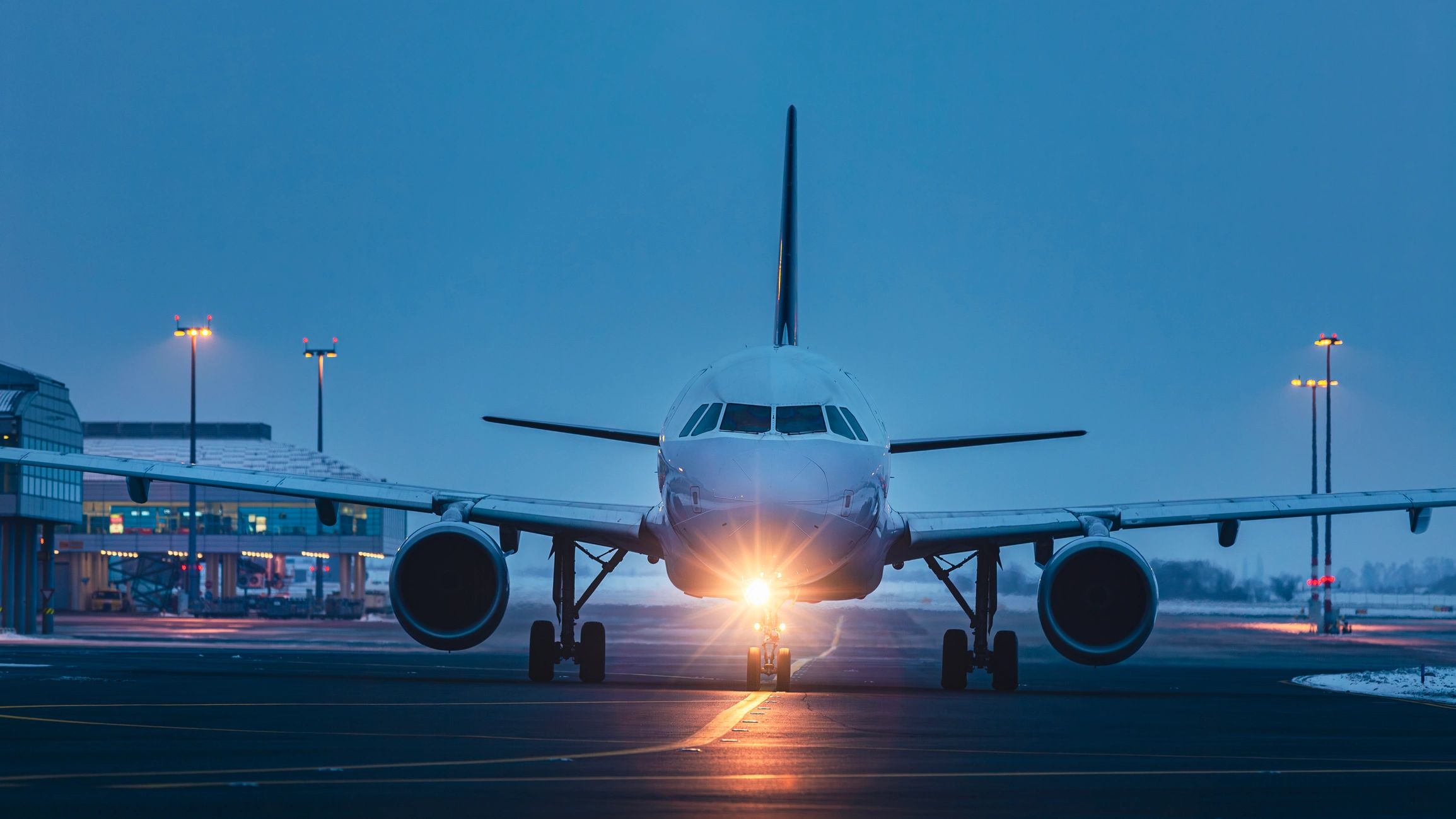 Passenger aircraft at airport at night